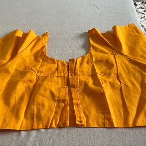 Brand new orange cotton blouse . Size 34
